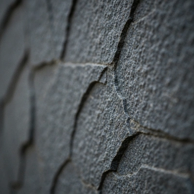 Close-up of different types of temporary fencing materials like chain link, plastic, and steel barriers